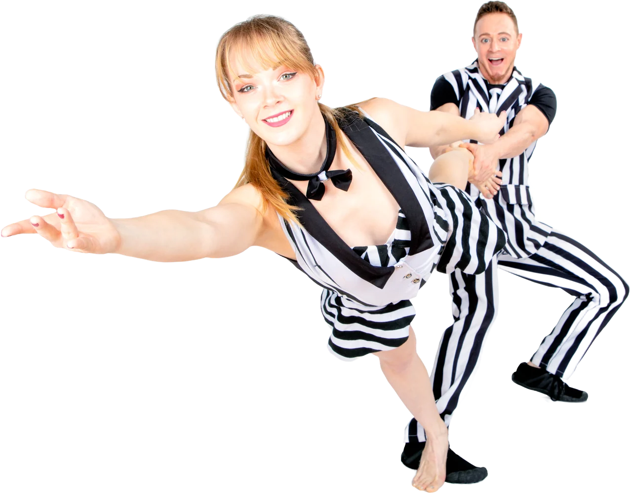 Nova leaning far out toward the camera, held by Rocco, both in black and white striped costumes