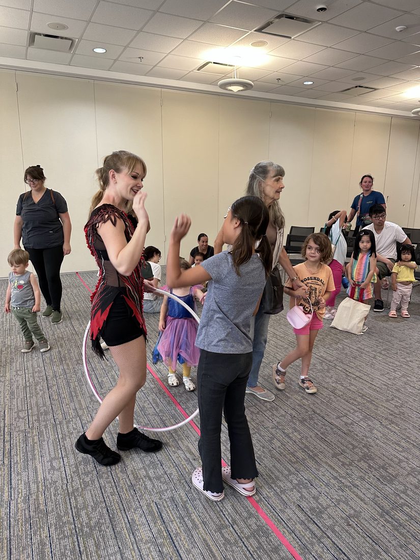 Children hula hooping with Nova